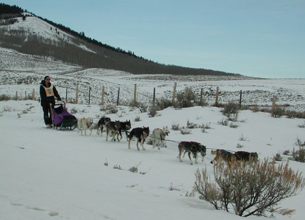 Racing near Black Butte. Photo by Clint Gilchrist, Pinedale Online.