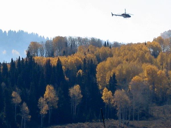 Dropping ping pong ball igniters. Photo by USFS.