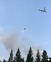 Helicopter Bucket Drop. Photo by Dawn Ballou, Pinedale Online.