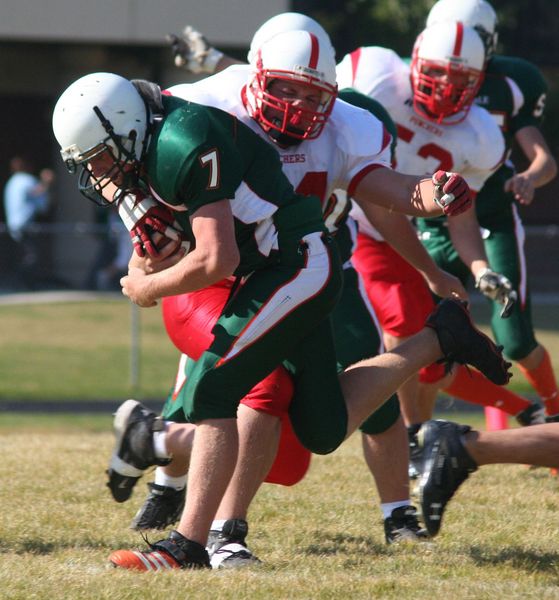 Trying to strip the ball. Photo by Clint Gilchrist, Pinedale Online.