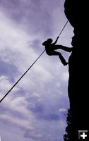 Repelling. Photo by Mark Gocke, Wyoming Game & Fish Department.