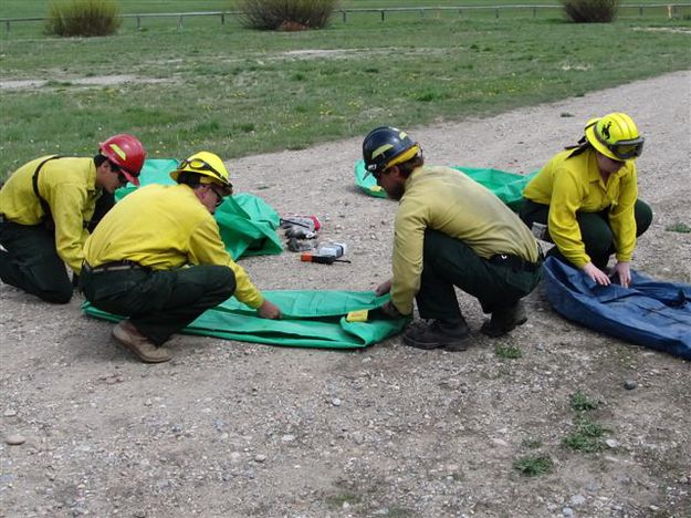 Folding Fire Shelters. Photo by T.J. Hunt.