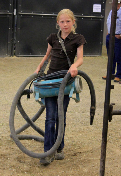 Carrying a dryer. Photo by Dawn Ballou, Pinedale Online.