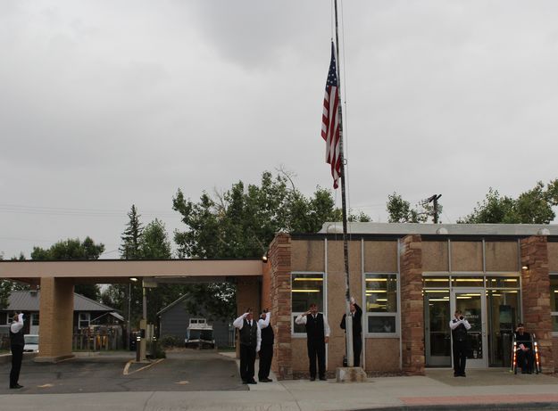 Flag raising. Photo by Carie Whitman.