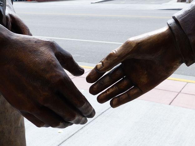 Handshake. Photo by Dawn Ballou, Pinedale Online.