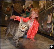 Miss Scanlon is Impressed by Cats Tail. Photo by Terry Allen.