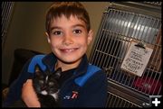 Declan Lobbies for a Kitten. Photo by Terry Allen.