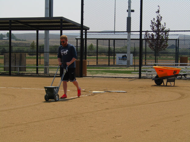 Marking baselines. Photo by Dawn Ballou, Pinedale Online.