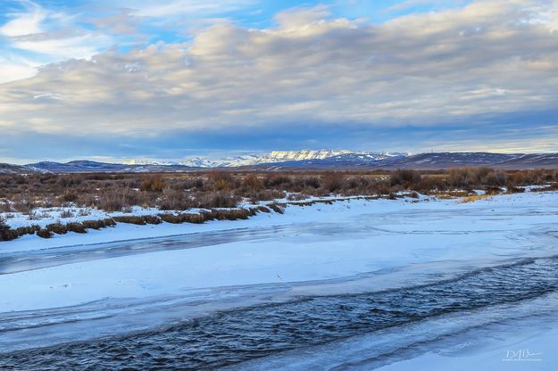 Distant Sawtooth Over The Green River. Photo by Dave Bell.