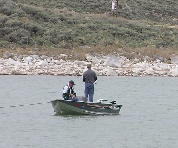 Fishing from their boat. Photo by Pinedale Online.