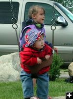 A little help swinging. Photo by Pinedale Online.