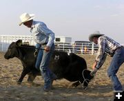 Releasing the ropes. Photo by Dawn Ballou, Pinedale Online.