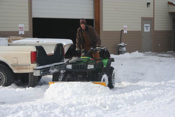 Pushing Snow. Photo by Clint Gilchrist, Pinedale Online!.