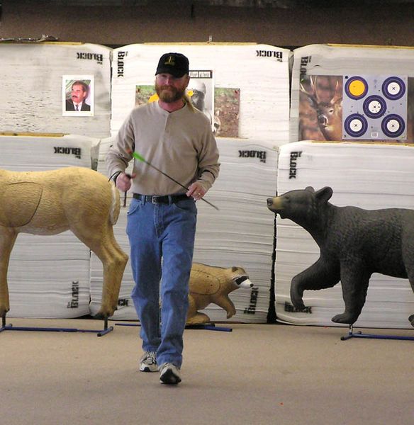 Trevor brings back his arrows. Photo by Dawn Ballou, Pinedale Online.