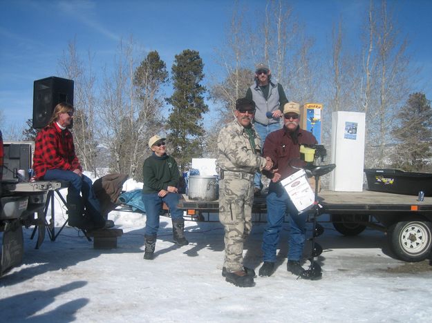 Dave Parrish wins an ice augar. Photo by Bill Boender.