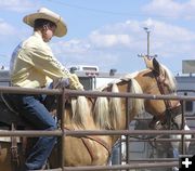 Braiding the mane. Photo by Dawn Ballou, Pinedale Online.