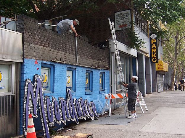 Taking it down. Photo by John Moore.