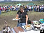 Pam grabs a bite. Photo by Bob Rule, KPIN 101.1 FM Radio.