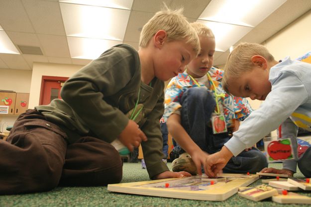 Doing Puzzles. Photo by Pam McCulloch .