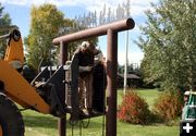 Welding on the sign. Photo by Pinedale Online.