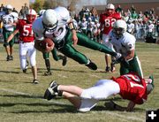 Flying Tackle. Photo by Clint Gilchrist, Pinedale Online.