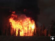 Orange flames boil up. Photo by Kenna Tanner.