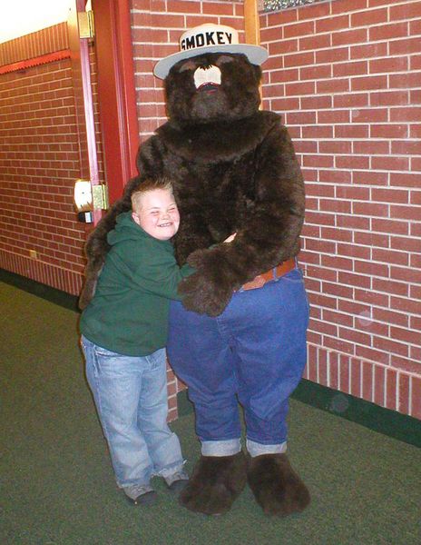 Giving Smokey a hug. Photo by Bridger-Teton National Forest.