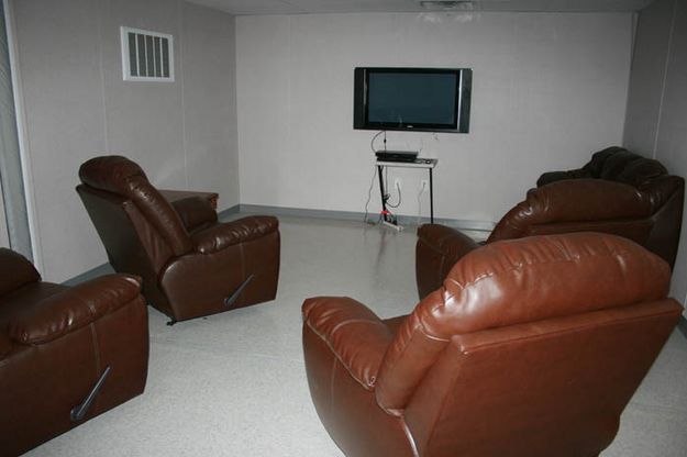 Lounge area with big screen TV. Photo by Dawn Ballou, Pinedale Online.