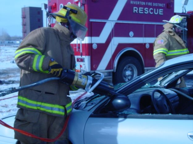 Working on the windshield. Photo by Sublette County Fire Board.