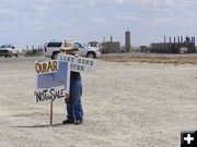 Arranging signs. Photo by Sue Sommers.