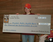 Pedigree donation. Photo by Dawn Ballou, Pinedale Online.