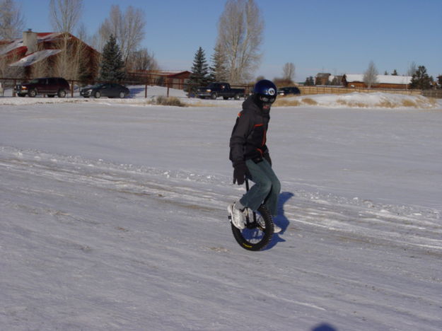 Nathan Stewart on unicycle. Photo by Craig Sheppard.