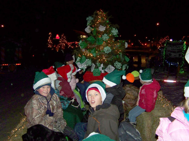 Riding the float. Photo by Ranae C. Lozier.