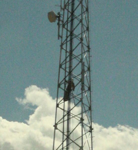 Tower climber. Photo by Dawn Ballou, Pinedale Online.