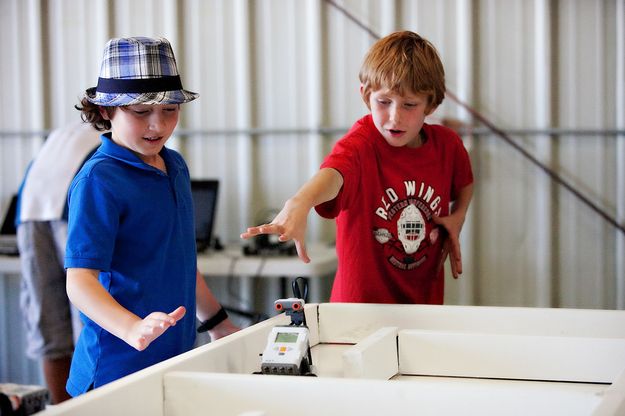 Testing the robot. Photo by Tara Bolgiano, Blushing Crow Photography.