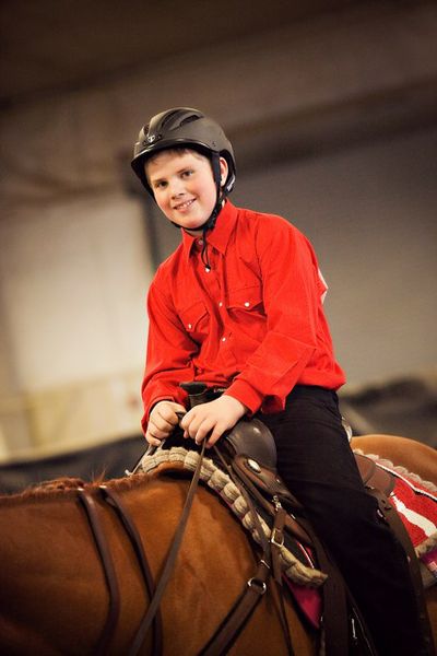 Happy rider. Photo by Tara Bolgiano, Blushing Crow Photography.