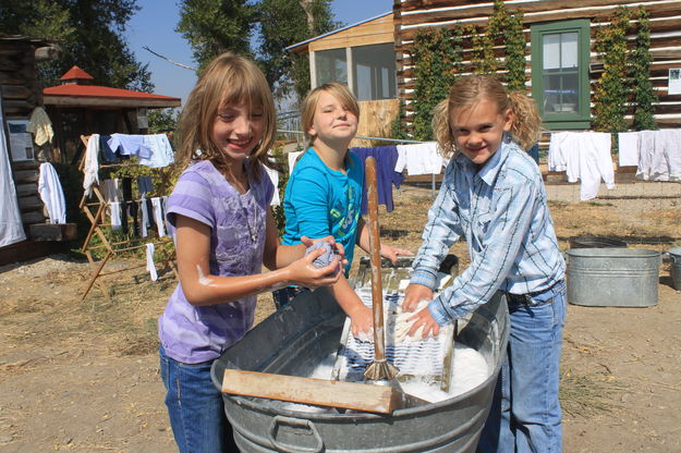 Having fun washing. Photo by Dawn Ballou, Pinedale Online.