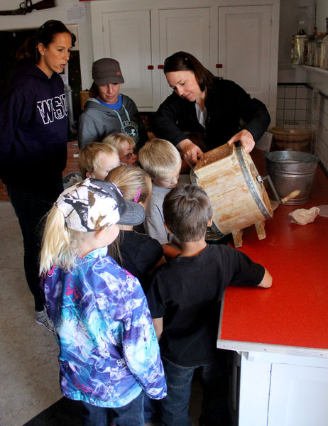 Making butter. Photo by Pinedale Online.