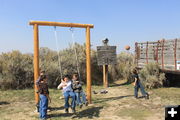 Swinging and shooting hoops. Photo by Dawn Ballou, Pinedale Online.