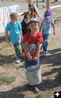 Carrying water. Photo by Clint Gilchrist, Pinedale Online.