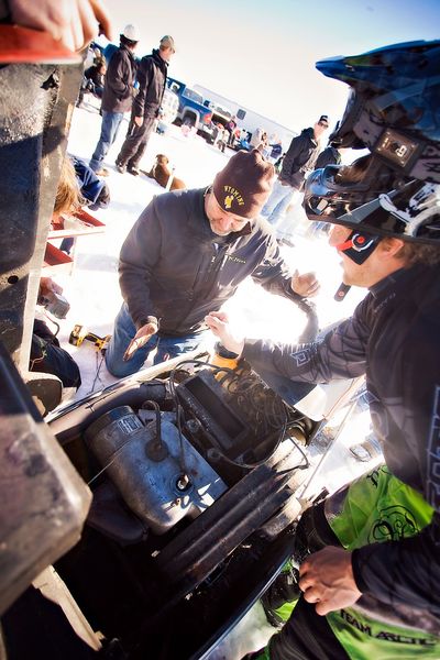 Checking out the engine. Photo by Tara Bolgiano, Blushing Crow Photography..