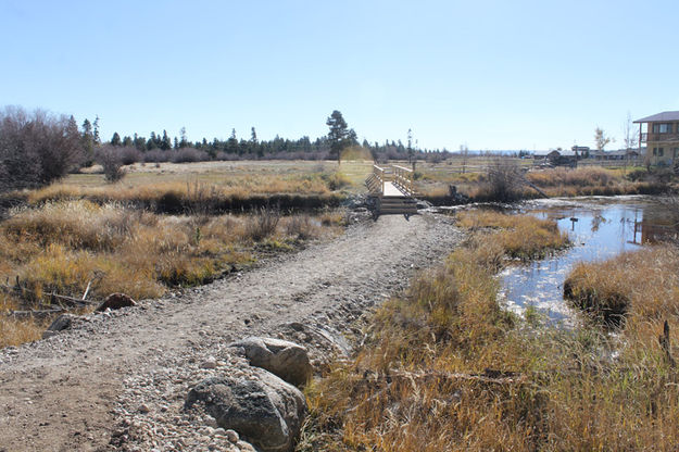 Leading to footbridge. Photo by Dawn Ballou, Pinedale Online.