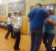 Learning to dance. Photo by Tawnya Miller, Big Piney Branch  Sublette County Library.