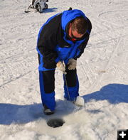 Scooping it out. Photo by Terry Allen.