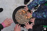 Warming Hands. Photo by Terry Allen, Pinedale Online.