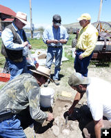 Looking at what was found. Photo by Dawn Ballou, Pinedale Online.