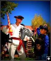 Jason Teaches a Student Knight. Photo by Terry Allen.