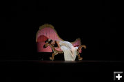 Clara asleep with beloved Nutcracker. Photo by Arnold Brokling.