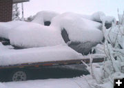 Buried snowmachines. Photo by Dawn Ballou, Pinedale Online.