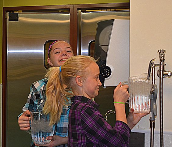 Volunteer Water Servers. Photo by Terry Allen.